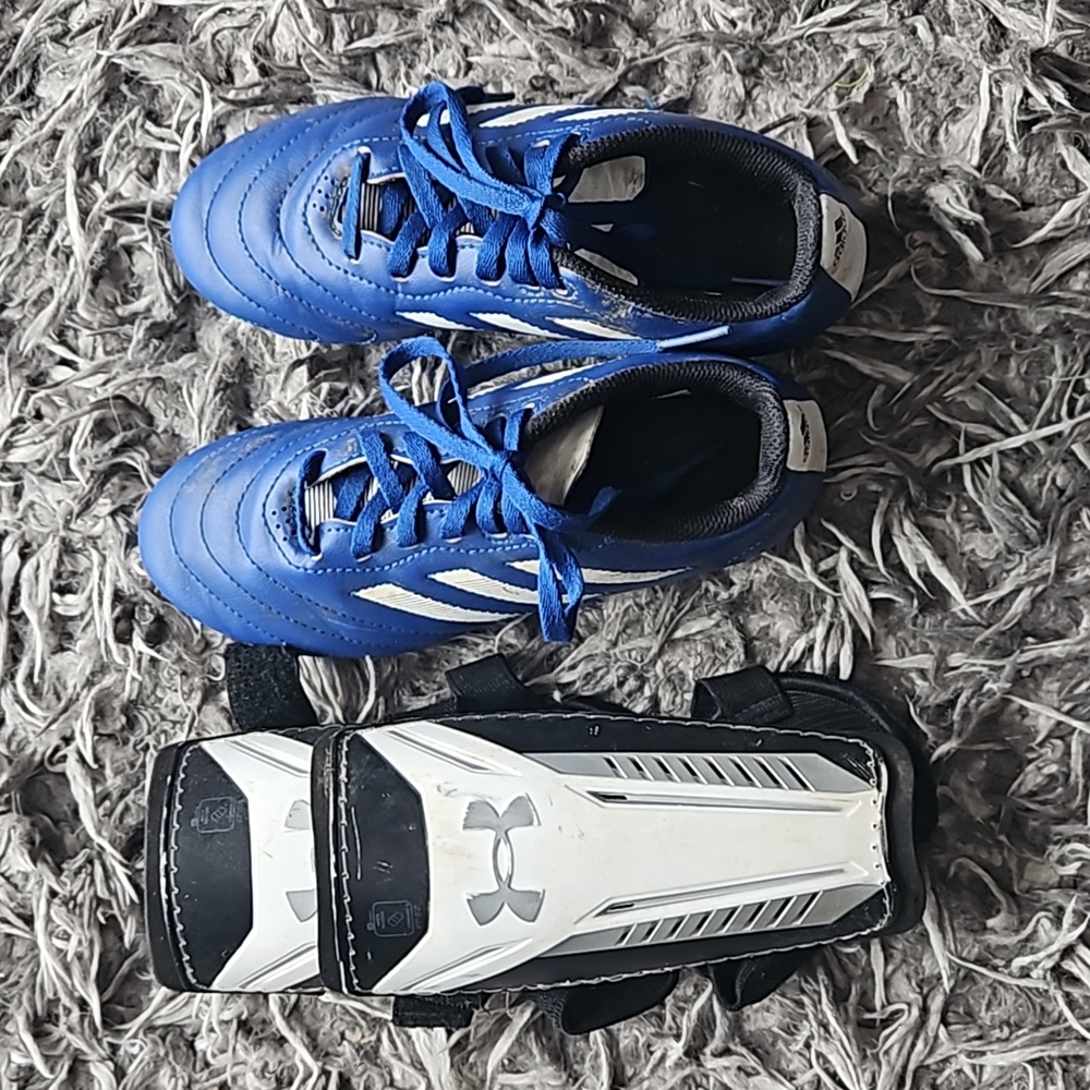 Soccer cleats with shin guards